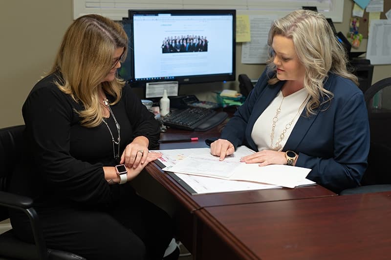 Brock & Stout Andalusia attorney meeting with a client